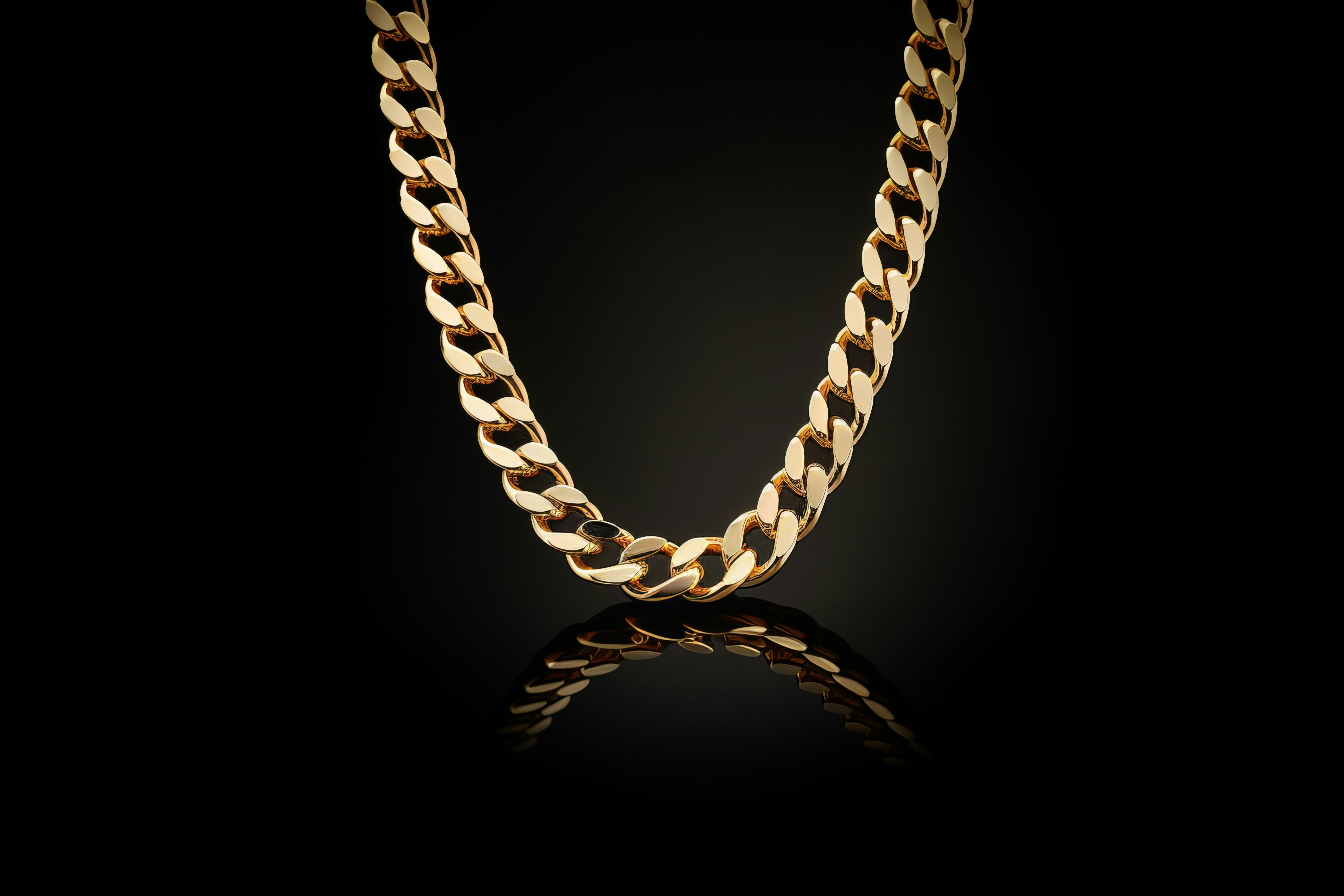 Gold chain on dark background