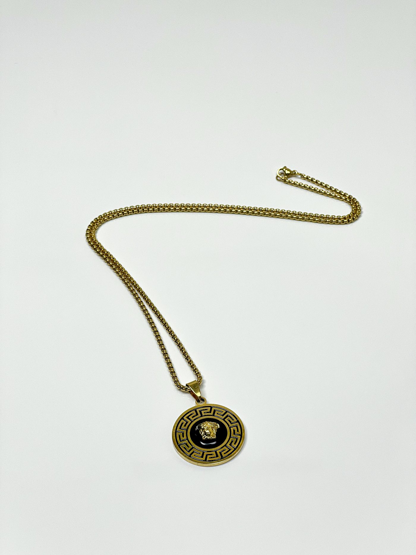 Medallion necklace on a white background